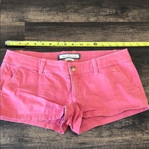 Pink shorts.